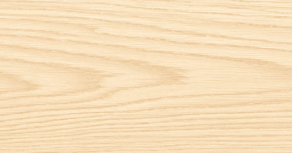 Clean white oak wood flooring in a brightly lit residential space. The flooring has a subtle grain pattern.